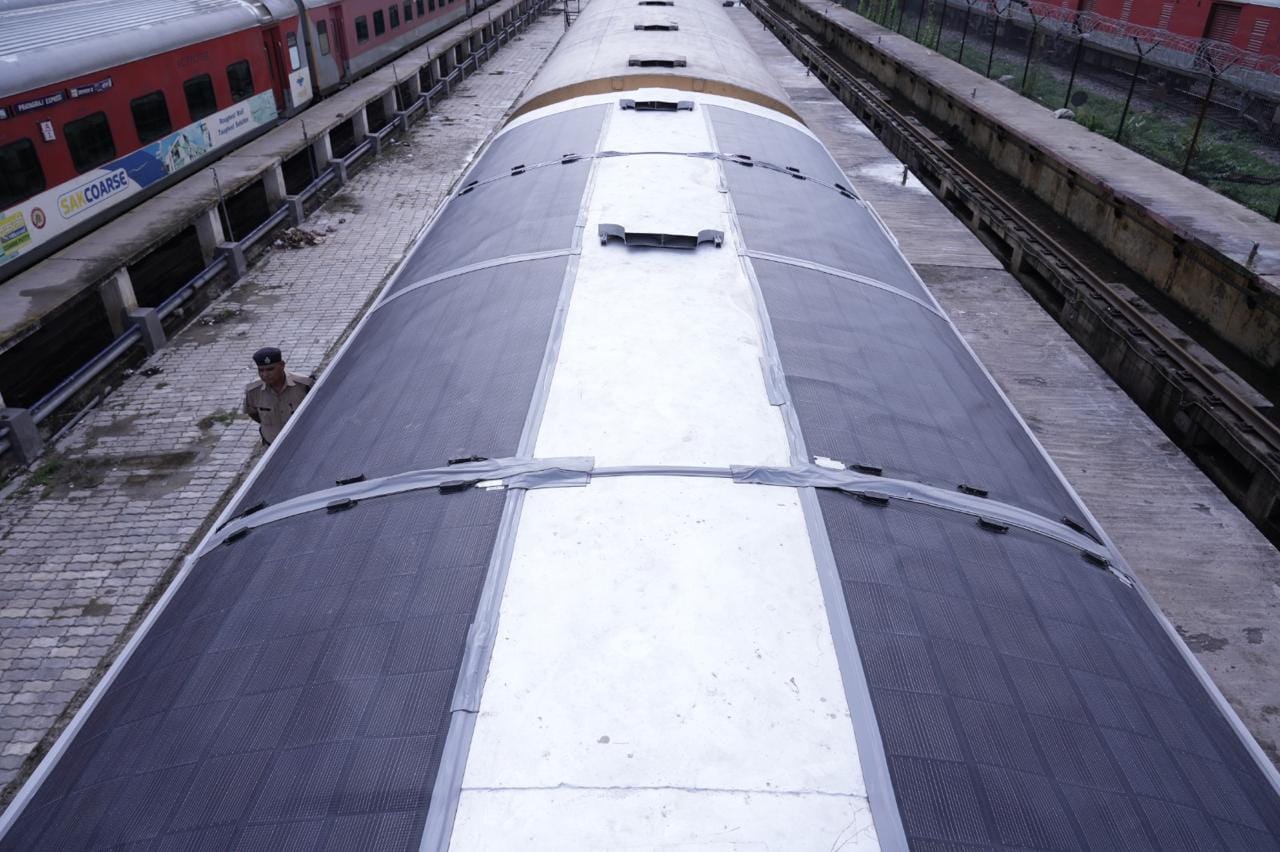Indian Railways solar assisted passenger coach with rooftop solar panels in Prayagraj NCR